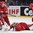 OSTRAVA, CZECH REPUBLIC - MAY 3: Belarus' Kevin Lalande #35 smothers the puck in front of Nikolai Stasenko #5 and Oleg Yevenko #25 during preliminary round action at the 2015 IIHF Ice Hockey World Championship. (Photo by Richard Wolowicz/HHOF-IIHF Images)

